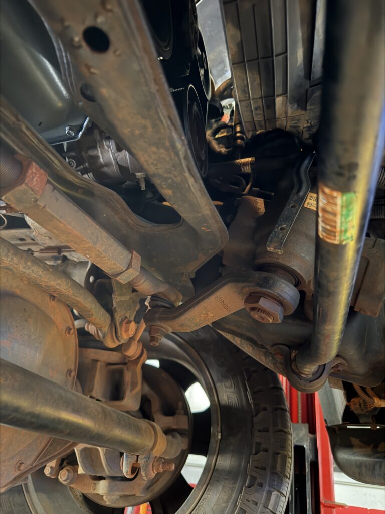 Steering and suspension repair on a truck at Auto Trans M.D. in West Palm Beach